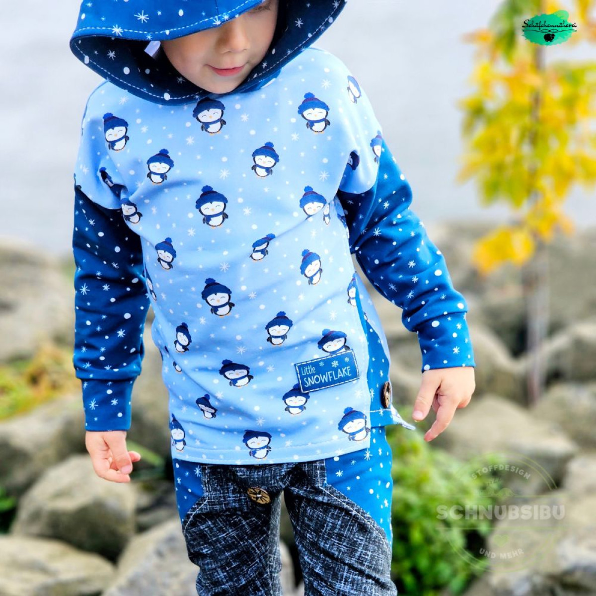 French Terry Winterpinguine blau